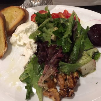 Spizzico - Half eaten Italian burrata with garlic toast, bitter salad, beet, cherry tomatoes and candied walnuts. Amazing. - Italian Near Me - Maple, Ontario