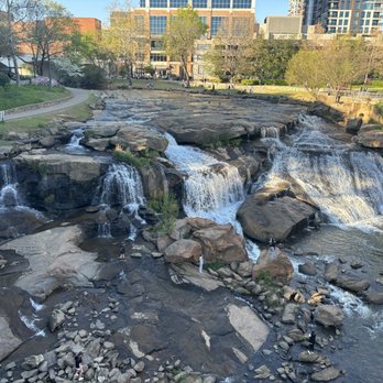 Falls Park - Falls taken from the suspension bridge - Venues & Event Spaces Near Me - Greenville, South Carolina Falls Park - Falls taken from the suspension bridge - Venues & Event Spaces Near Me - Greenville, South Carolina