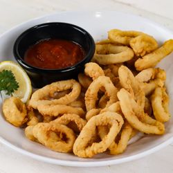 Crispy calamari fried fresh daily A must-try seafood appetizer in San Antonio & New Braunfels. Local, family-owned favorites!
