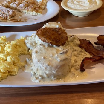 Ruby Sunshine Charlotte Southend - Sausage gravy biscuits with bacon, eggs, fried green tomato. Pancake on the side. - Breakfast & Brunch Near Me - Charlotte, North Carolina