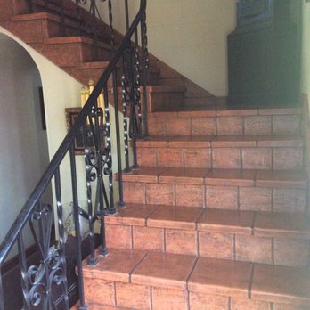 Period Piece Restorations - Our magnesite stairs that he worked on. They used to be a salmon color. - General Contractors Near Me - Glendale, California Period Piece Restorations - Our magnesite stairs that he worked on. They used to be a salmon color. - General Contractors Near Me - Glendale, California