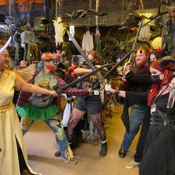 Costumes Plus - We have lots of fun during Halloween at the store! Angels vs Demons!