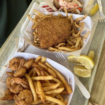 The Clam Castle - Bottom to top: Fried shrimp platter with fries, fried fish platter with onion strings, and lobster roll. - Seafood Near Me - Madison, Connecticut