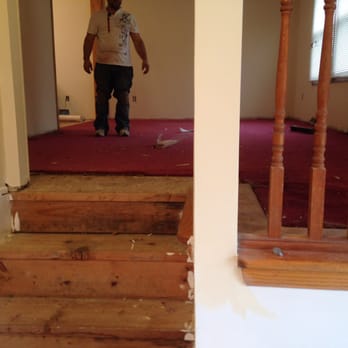 United Hardwood Floors - a man walking up a flight of stairs - Flooring Near Me - Long Branch, New Jersey United Hardwood Floors - a man walking up a flight of stairs - Flooring Near Me - Long Branch, New Jersey