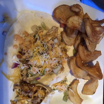 The Local's Eatery - Taco chicken. They smoke the chicken, it's juicy and amazing with pineapple pico de gallo. - Gastropubs Near Me - Niceville, Florida The Local's Eatery - Taco chicken. They smoke the chicken, it's juicy and amazing with pineapple pico de gallo. - Gastropubs Near Me - Niceville, Florida