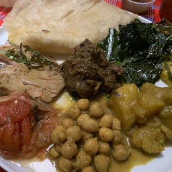 Cane - Potato curry, beef curry, chicken curry, channa curry, tomato choka, crispy kale, naan - Trinidadian Near Me - Washington, DC, District of Columbia Cane - Potato curry, beef curry, chicken curry, channa curry, tomato choka, crispy kale, naan - Trinidadian Near Me - Washington, DC, District of Columbia