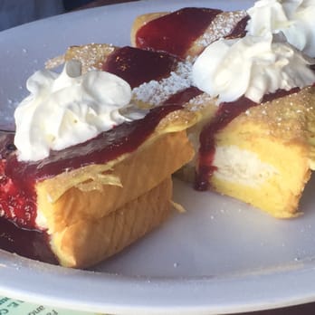 Island Cafe - French toast stuffed with cream cheese and smothered with raspberry sauce and whipped topping. - Breakfast & Brunch Near Me - Anacortes, Washington Island Cafe - French toast stuffed with cream cheese and smothered with raspberry sauce and whipped topping. - Breakfast & Brunch Near Me - Anacortes, Washington