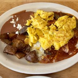 La Cocina de Luz - Eggs over tortilla chips with cheese and sauce