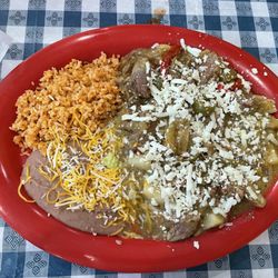Aztecas Margarita Bar & Grill - Carne DE Puerco EN Salsa Verde Marinated Pork, green peppers, onions, potato smothered in Green salsa Verde
