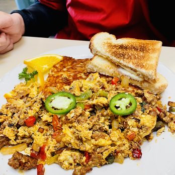 Peg's Glorified Ham & Eggs - Chorizo Scramble ($16.99) with bell pepper & onion, hash browns and unlimited toast - Breakfast & Brunch Near Me - Reno, Nevada Peg's Glorified Ham & Eggs - Chorizo Scramble ($16.99) with bell pepper & onion, hash browns and unlimited toast - Breakfast & Brunch Near Me - Reno, Nevada