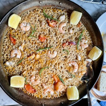 Malagon - This is their version of seafood Paella. Had fancy and, I'm sure, expensive ingredients that still didn't make it great Paella. - Spanish Near Me - Charleston, South Carolina Malagon - This is their version of seafood Paella. Had fancy and, I'm sure, expensive ingredients that still didn't make it great Paella. - Spanish Near Me - Charleston, South Carolina