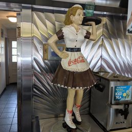 Coca Cola skate server statue