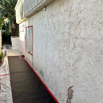 Iconic Plastering Group - Masked & prepped stucco repair - Stucco Services Near Me