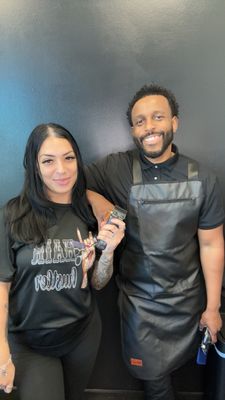 Meet The Owners Gaby and Tyrhee! - The History of The Wee Goood Collective Established in 2024, The Wee Goood Collective was founded by Tyrhee Spivey, Hillary Gonzalez, and Gabby Gamez—three professionals with a shared vision: to create a space where top-tier barbering, beauty, and community come together. With Tyrhee’s 15+ years of expertise, Hillary’s 30 years of industry leadership, and Gabby’s 7 years of mastering both men’s and women’s cuts, the goal was clear—deliver high-quality service with a welcoming, family-like atmosphere. What started as an idea to provide elite fades, precise beard trims, and expert beauty services has become a movement in Richmond, TX. The Wee Goood Collective is more than a barbershop—it’s a place for professionals, creatives, and entrepreneurs to connect. Specializing in men’s and women’s haircuts, beard trims, hot towel treatments, silk presses, color, and scalp treatments, we take pride in ensuring every client leaves looking and feeling their best. Too late—you’re family now. Meet The Owners Gaby and Tyrhee! - The History of The Wee Goood Collective Established in 2024, The Wee Goood Collective was founded by Tyrhee Spivey, Hillary Gonzalez, and Gabby Gamez—three professionals with a shared vision: to create a space where top-tier barbering, beauty, and community come together. With Tyrhee’s 15+ years of expertise, Hillary’s 30 years of industry leadership, and Gabby’s 7 years of mastering both men’s and women’s cuts, the goal was clear—deliver high-quality service with a welcoming, family-like atmosphere. What started as an idea to provide elite fades, precise beard trims, and expert beauty services has become a movement in Richmond, TX. The Wee Goood Collective is more than a barbershop—it’s a place for professionals, creatives, and entrepreneurs to connect. Specializing in men’s and women’s haircuts, beard trims, hot towel treatments, silk presses, color, and scalp treatments, we take pride in ensuring every client leaves looking and feeling their best. Too late—you’re family now.