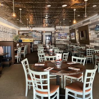 Reel Fish Coastal Kitchen & Bar - One of the dining areas. - Seafood Near Me - Winter Park, Florida Reel Fish Coastal Kitchen & Bar - One of the dining areas. - Seafood Near Me - Winter Park, Florida