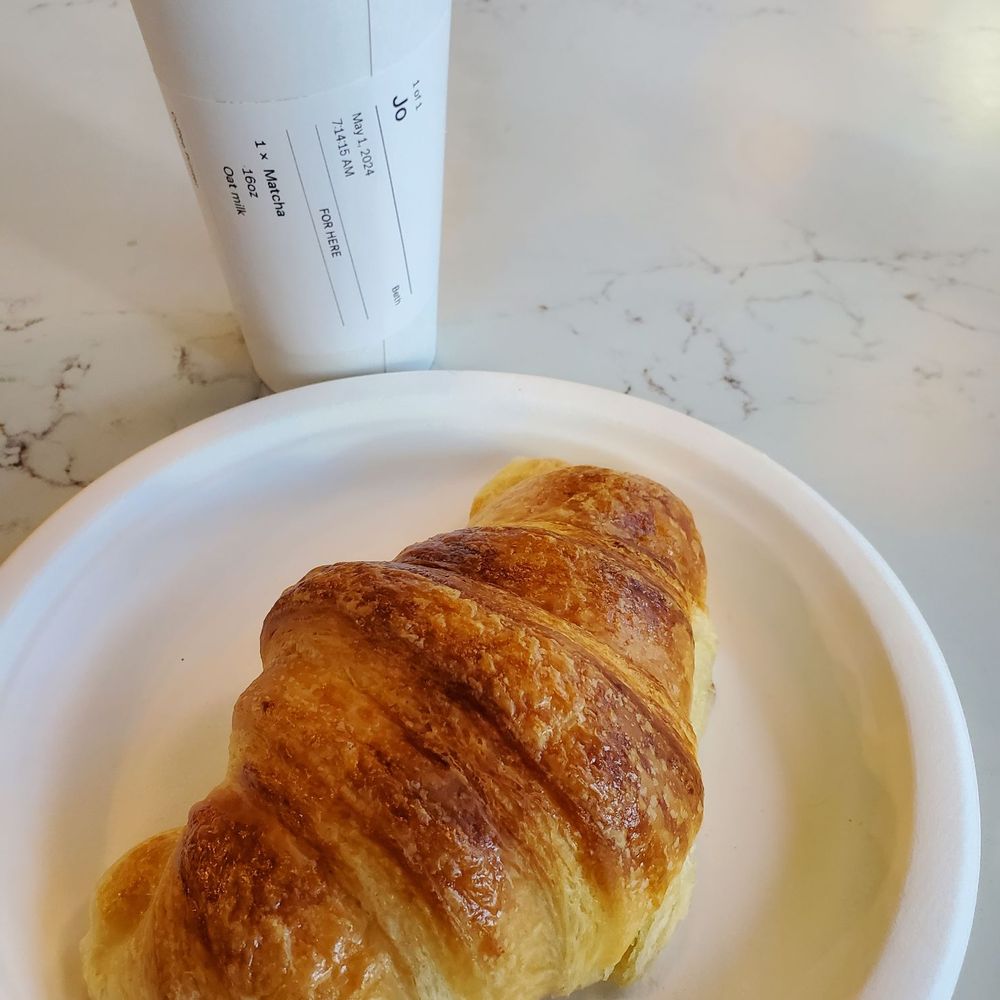 Trompeau Bakery - Matcha Latte with Oatmilk and Butter Croissant - Bakeries Near Me - Denver, Colorado Trompeau Bakery - Matcha Latte with Oatmilk and Butter Croissant - Bakeries Near Me - Denver, Colorado