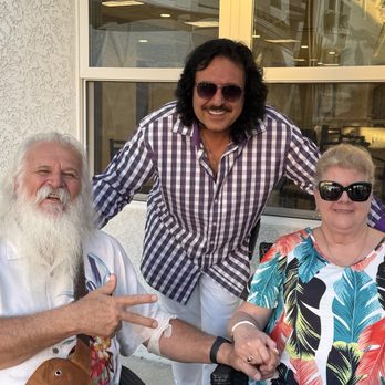 Balloons and Bites - My hubby that looks like Santa Claus, Tommy and me. - Balloon Services Near Me