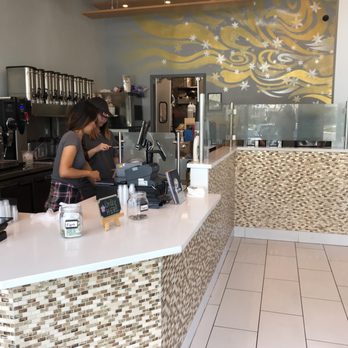 Teas'n You - Contemporary design counter with modern restroom through a very long corridor in the back - Bubble Tea Near Me - Vienna, Virginia