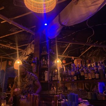 Broken Compass Tiki - Quick shot at the bar. Lots of booze to choose from. - New American Near Me - Burbank, California