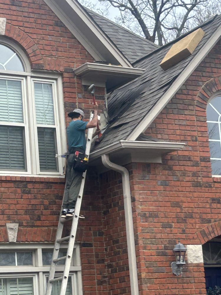 Slide of Dos Amigos Roofing