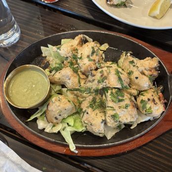 Roaring Indian Plates & Pours - Murgh Malai Makhmali. Clay oven Chicken with a green chili sauce - Indian Near Me - Maple Valley, Washington Roaring Indian Plates & Pours - Murgh Malai Makhmali. Clay oven Chicken with a green chili sauce - Indian Near Me - Maple Valley, Washington