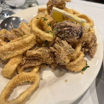 La Famiglia - a plate of fried squids - Italian Near Me - Babylon, New York La Famiglia - a plate of fried squids - Italian Near Me - Babylon, New York