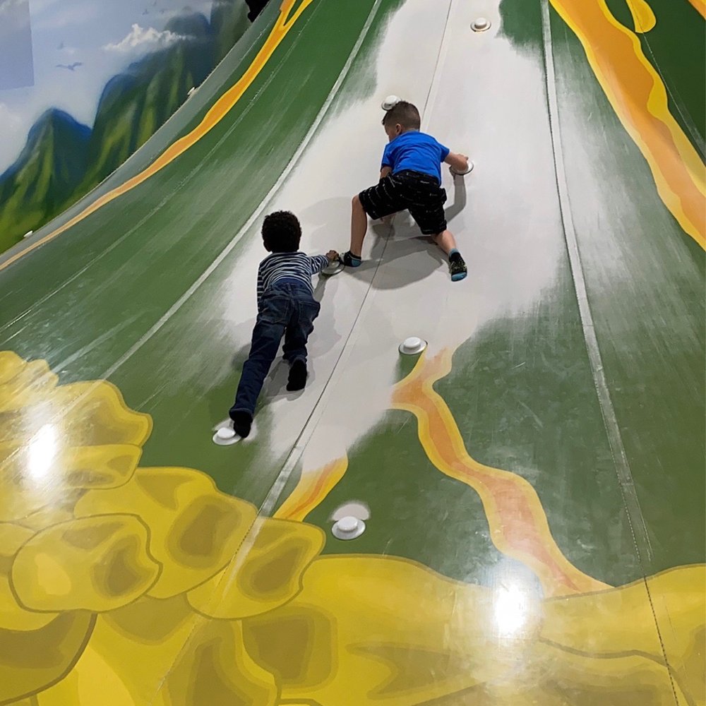 Lava Island - The volcano climbing and slide area - Trampoline Parks Near Me - Aurora, Colorado Lava Island - The volcano climbing and slide area - Trampoline Parks Near Me - Aurora, Colorado