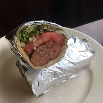 Durum Doner - Adena kabob wrap with lettuce, tomaro and onion. White sauce is served in the side. - Turkish Near Me - Totowa, New Jersey Durum Doner - Adena kabob wrap with lettuce, tomaro and onion. White sauce is served in the side. - Turkish Near Me - Totowa, New Jersey