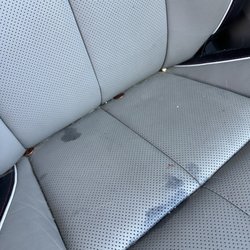 El Motor City Car Wash - Boynton Beach - Passenger seat after I lifted up the folder