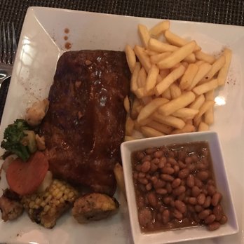 Polynesio - Half order of house smoked ribs, French fries and baked beans - Cuban Near Me - Hialeah Gardens, Florida