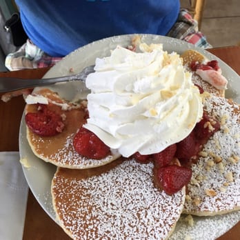 Eggs 'n Things Saratoga - Strawberry Macadamia Nuts Pancakes topped with Whip Cream...MMMM - Breakfast & Brunch Near Me - Honolulu, Hawaii