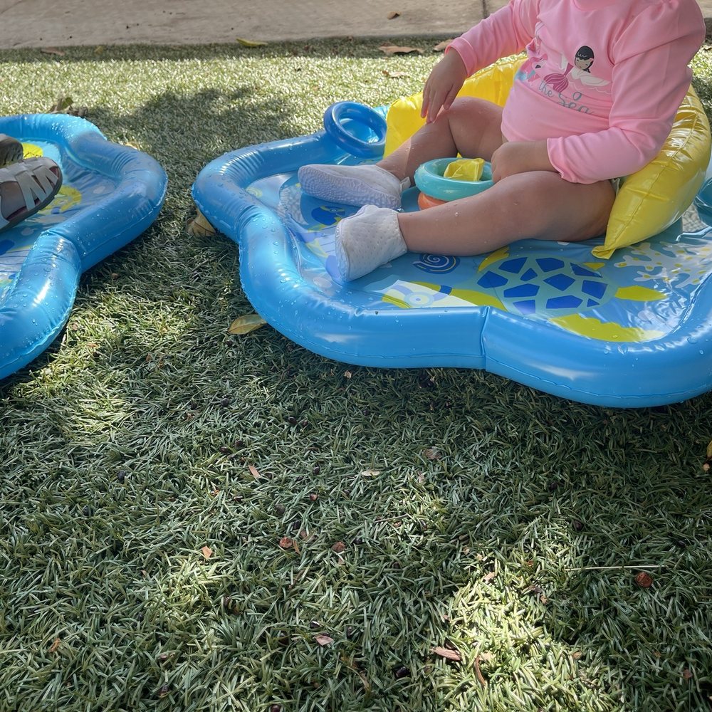 Toddler splashing around Toddler splashing around