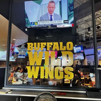 Buffalo Wild Wings - a man on a television screen - Chicken Wings Near Me - High Point, North Carolina Buffalo Wild Wings - a man on a television screen - Chicken Wings Near Me - High Point, North Carolina