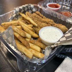Kids chicken tenders $11.50 plus tax. Lots of fries. Two skinny overcooked tenders.