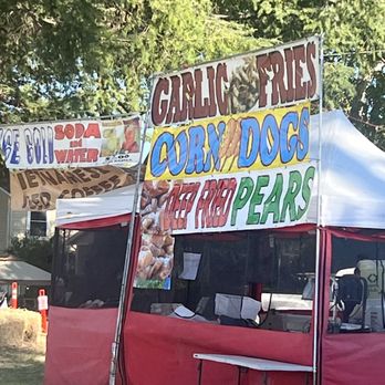 Pear Fair - Shot of a vendor with deep fried pears - Festivals Near Me - Courtland, California