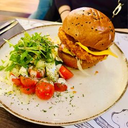 Asllani's Corner - Crispy chicken burger with side salad