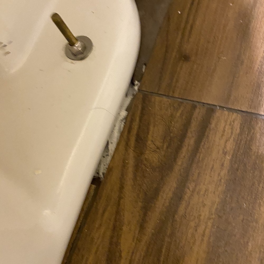 Romanoff Renovations - What about this is a professional install. We were told the toilet would cover it....it did not! - Flooring Near Me - Ashland, Virginia Romanoff Renovations - What about this is a professional install. We were told the toilet would cover it....it did not! - Flooring Near Me - Ashland, Virginia
