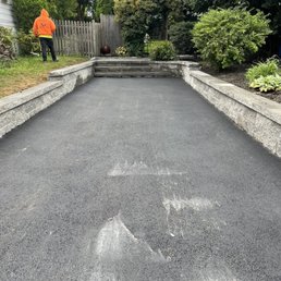New paved driveway and new stone retaining walls New paved driveway and new stone retaining walls