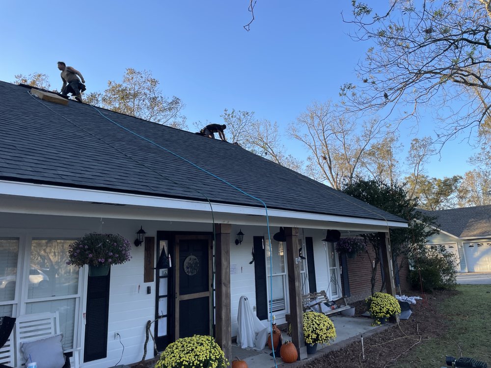 Slide of Tactical Roofing Pros