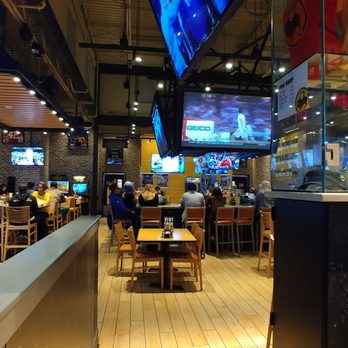 Buffalo Wild Wings - A large tv over the bar - American Near Me - Concord, California Buffalo Wild Wings - A large tv over the bar - American Near Me - Concord, California