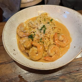 Tauro Cocina - Fettuccini al Mezcal with Shrimp. Has a delicious smokey cream sauce with just enough spice to complement. - Italian Near Me - Milwaukee, Wisconsin Tauro Cocina - Fettuccini al Mezcal with Shrimp. Has a delicious smokey cream sauce with just enough spice to complement. - Italian Near Me - Milwaukee, Wisconsin