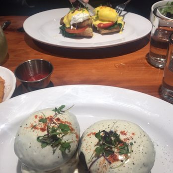Sibling by Pushkin's - His and hers eggs Benedict (top: meat eater pork belly Benedict, below: vegan portobello mushroom Benedict) - New American Near Me - Sacramento, California Sibling by Pushkin's - His and hers eggs Benedict (top: meat eater pork belly Benedict, below: vegan portobello mushroom Benedict) - New American Near Me - Sacramento, California