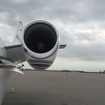 TAC Air - the engine of an airplane on the tarmac - Airport Lounges Near Me - Lexington, Kentucky TAC Air - the engine of an airplane on the tarmac - Airport Lounges Near Me - Lexington, Kentucky