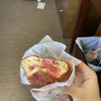 Leonard's Bakery - I'm not sure which one this is - guessing guava and lihing powder coating (Chinese plum powder). - Bakeries Near Me - Honolulu, Hawaii