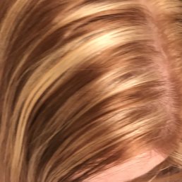 This is the chunky, awful, orange and yellow highlights she put in. This is the chunky, awful, orange and yellow highlights she put in.