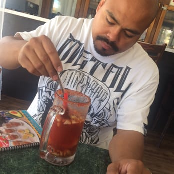 Mariscos Los Buchones - Hubby enjoying his Clamato estilo baja - Seafood Near Me - Long Beach, California
