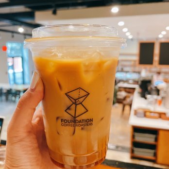 Foundation Coffee Roasters - Iced Vanilla Oat Milk Latte - Coffee Roasteries Near Me - Fairfax, Virginia Foundation Coffee Roasters - Iced Vanilla Oat Milk Latte - Coffee Roasteries Near Me - Fairfax, Virginia