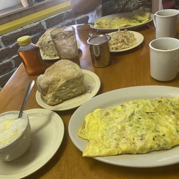 Harriette's Restaurant - Side of grits, homemade biscuits and a BYO omelette with shrimp, tomato, onions and green onions. - Breakfast & Brunch Near Me - Key Largo, Florida Harriette's Restaurant - Side of grits, homemade biscuits and a BYO omelette with shrimp, tomato, onions and green onions. - Breakfast & Brunch Near Me - Key Largo, Florida