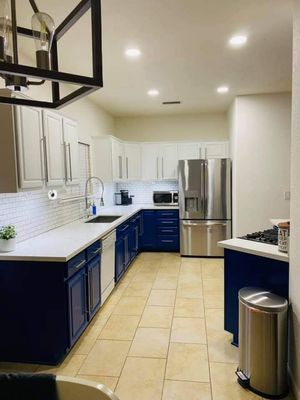 Kitchen Remodel - This kitchen was basic and boring. The new owner didn't have a huge budget, so we painted the cabinets, added a new backsplash, sink, faucet, and installed new LED lighting and appliances. came together really well, another happy client.