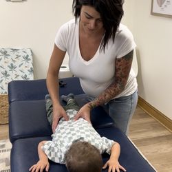 Motherbaby Wellness - Three year old getting chiropractic exam.